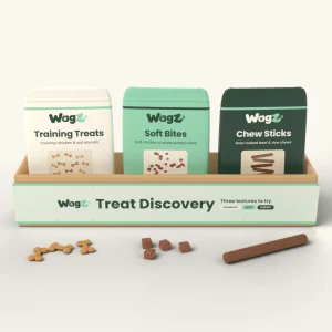 Kraft tray holding Wagz Training Treats, Soft Bites and Chew Sticks packs with treats in front